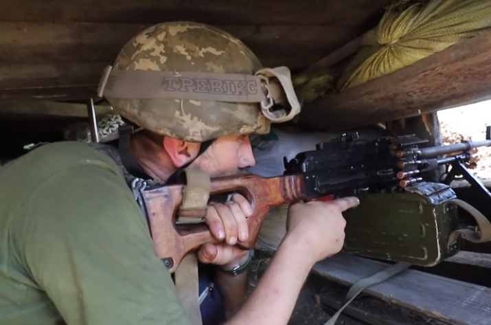 Сожженные дома, вражеский снайпер и бои в освобожденном Южном (видео)