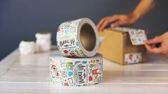 скотч з  логотипом